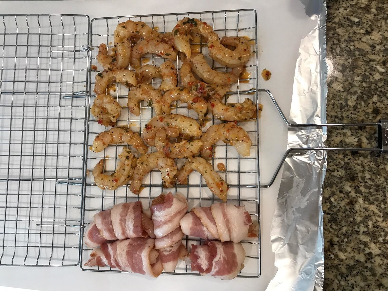 Bacon-wrapped shrimp and more shrimp in the grilling basket.