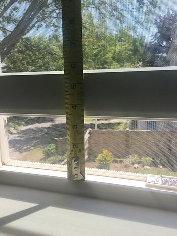 A measuring tape showing how open a window is able to get after placing the lock. The locks can be placed as high as you want, leaving more space to open the window.