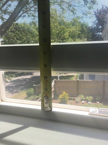 A measuring tape showing how open a window is able to get after placing the lock. The locks can be placed as high as you want, leaving more space to open the window. 