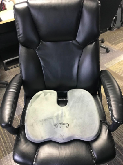 The cushion on a rolling desk chair