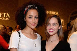 Nathalie Emmanuel and Emilia Clarke pose together