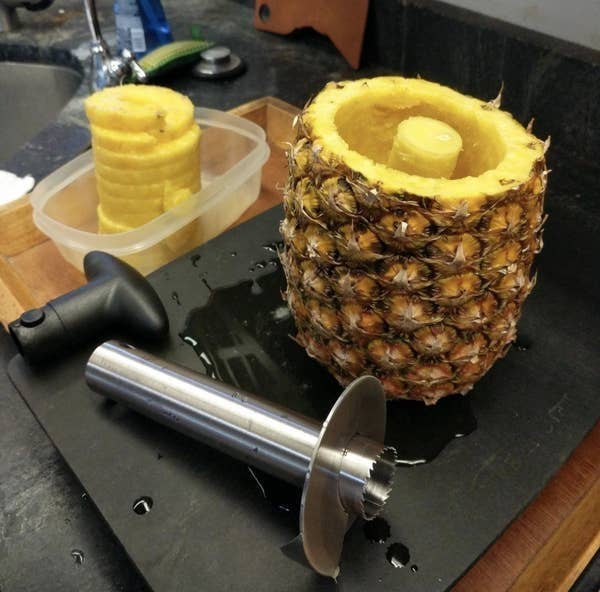 A reviewer photo of perfect rings of pineapple after using the stainless steel tool
