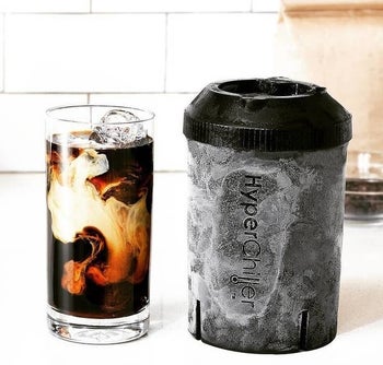 The frozen HyperChiller next to a glass of iced coffee