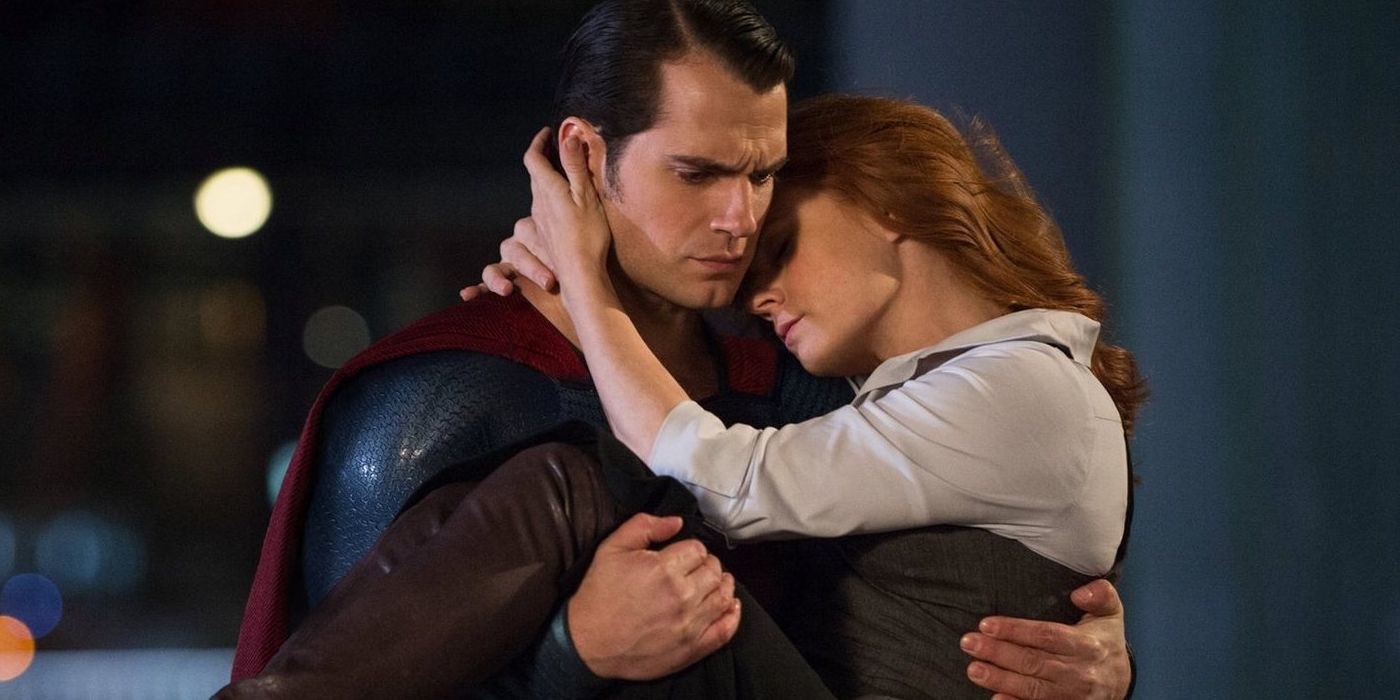 Henry Cavill as Superman carries Lois Lane (Amy Adams).