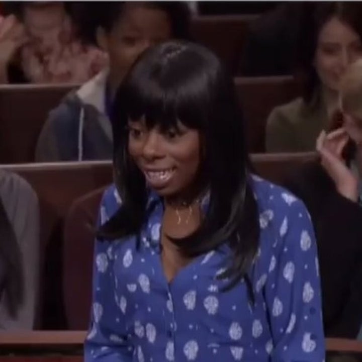 Reaction image of a shocked and appalled black girl.