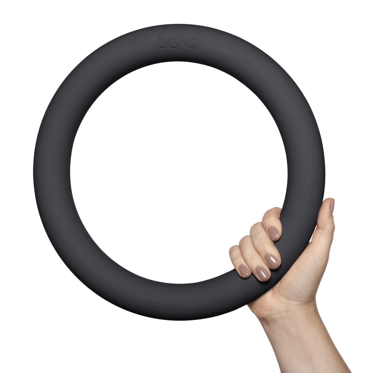A hand holding the oval ring in black