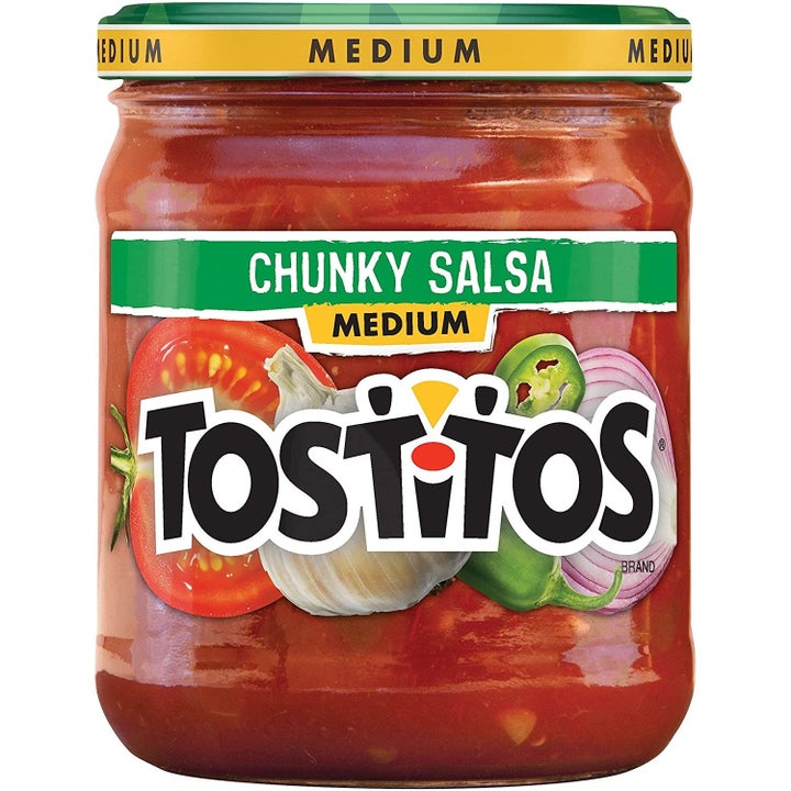 A jar of Tostitos chunky medium-spicy salsa.