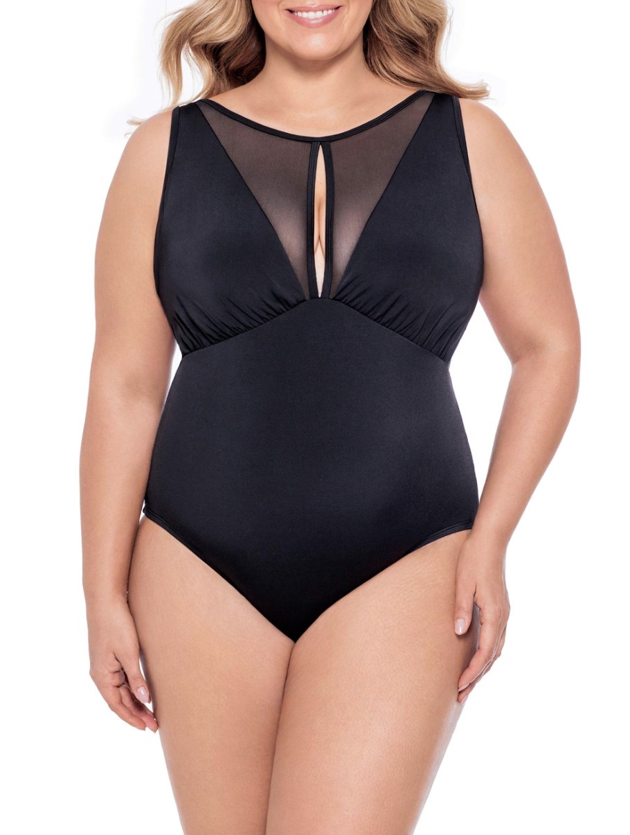 A model wearing the black one piece