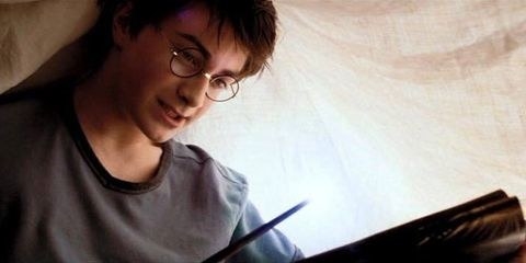Harry using &quot;lumos&quot; at The Dursleys house, underneath a sheet, to read late at night while everyone else is asleep