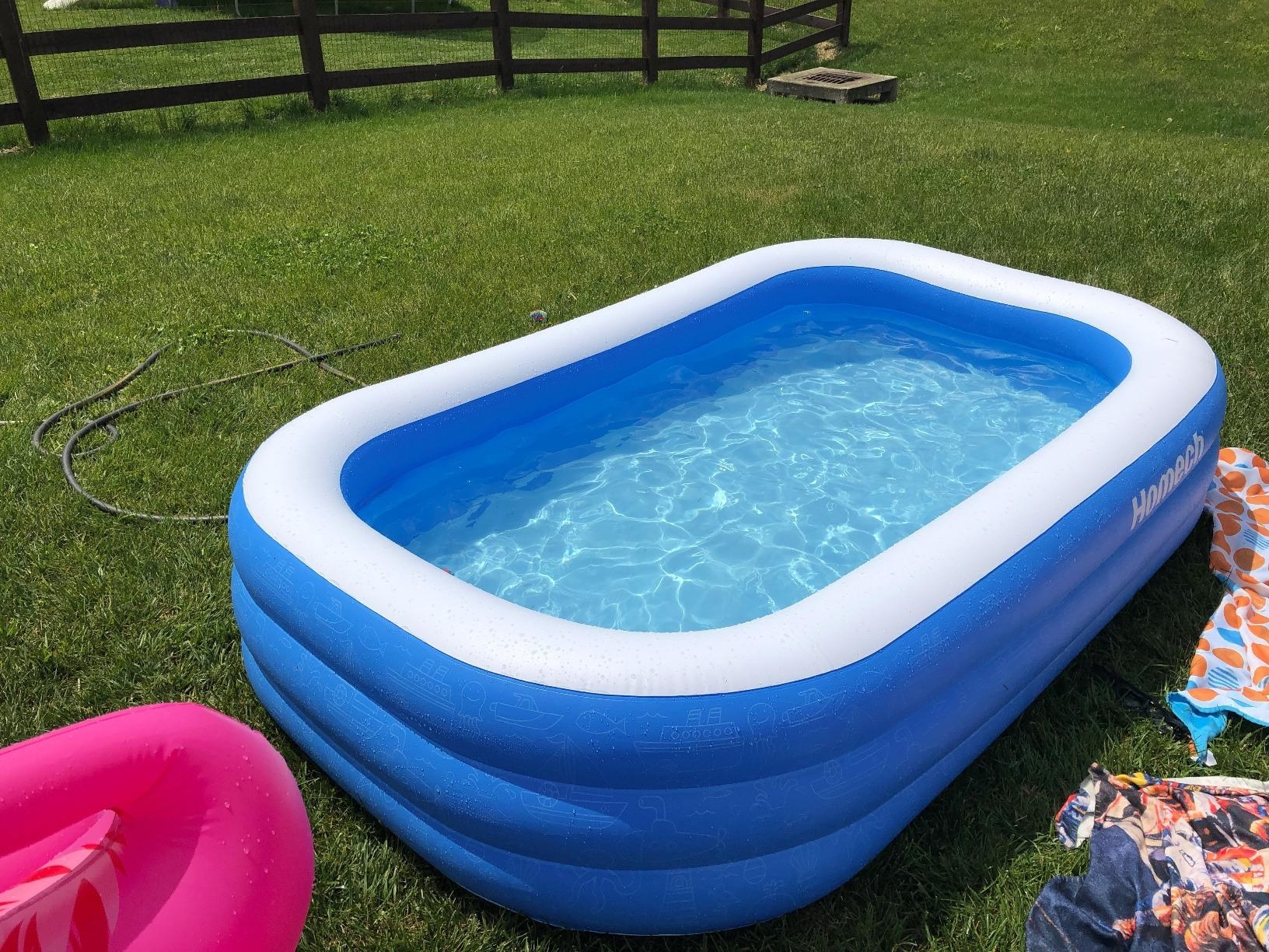 An inflatable blue rectangular with white trim 