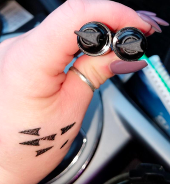 A close-up customer review photo of the liquid eyeliner tips