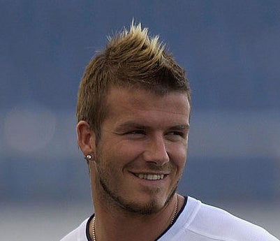 A photo of David Beckham during a practice sporting a faux hawks.