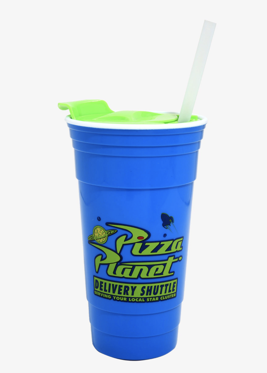 a blue plastic cup with green font that says pizza planet delivery shuttle serving your local star cluster
