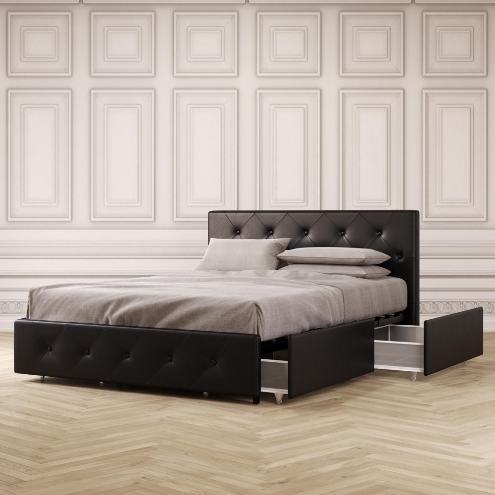 The black tufted bed frame with pull-out storage
