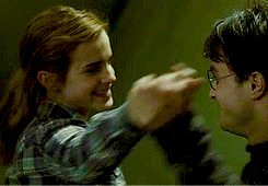 Harry and Hermione dancing in a tent.