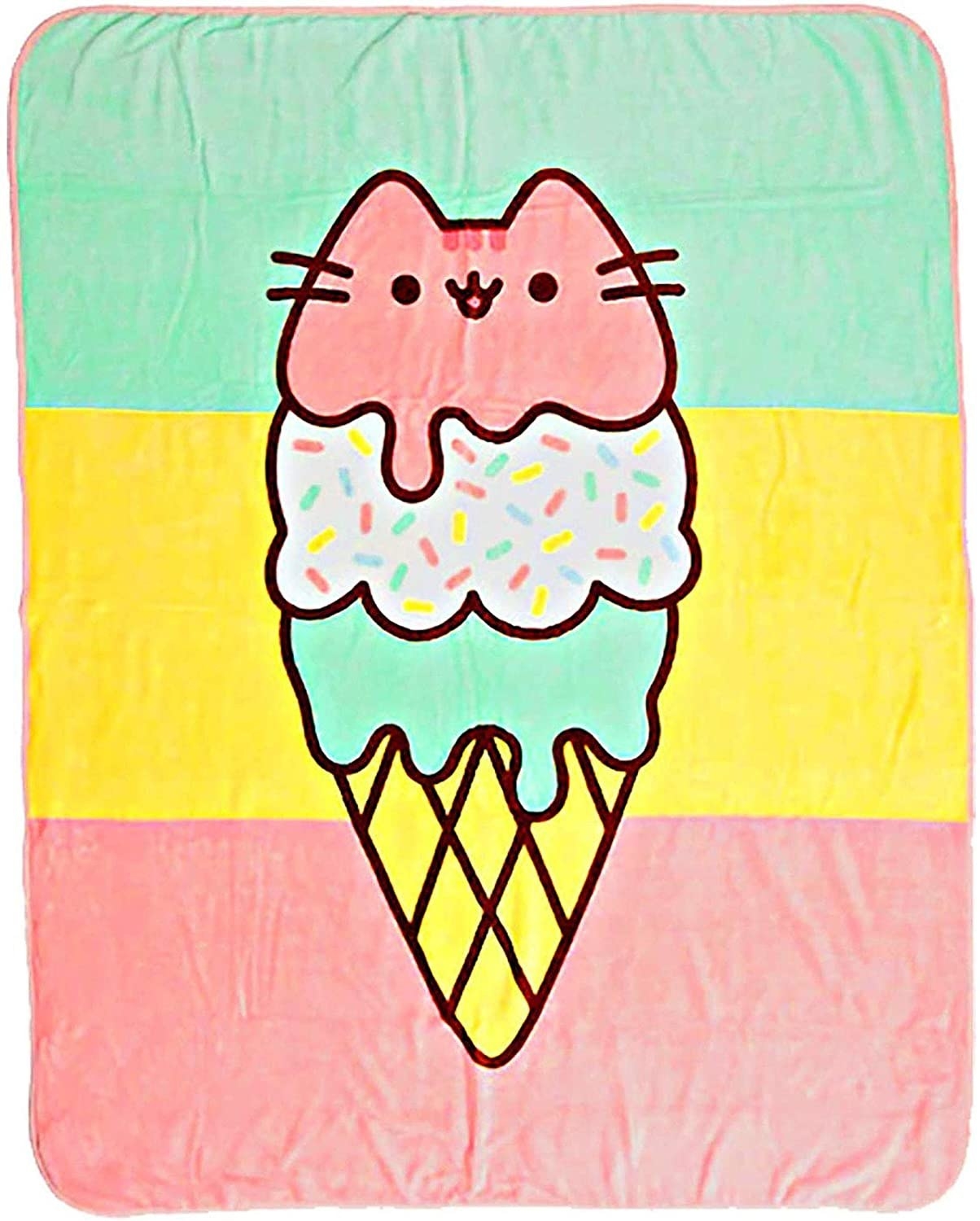 The pink, yellow, and green blanket featuring an ice cream cone with three scoops. The top one looks like Pusheen&#x27;s face