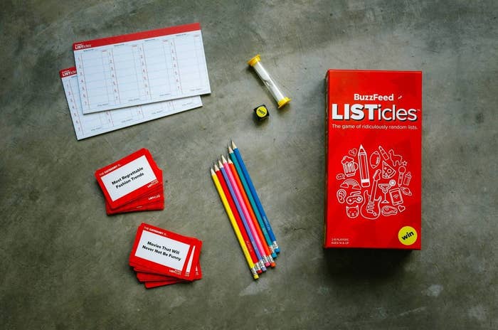 BuzzFeed Listicles box with pencils, dice, cards and other accompanying accessories included in the box.