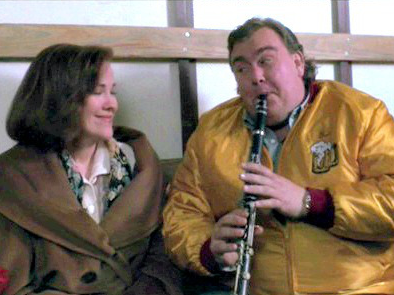 John Candy plays the clarinet in the back of the truck with Kevin&#x27;s mom