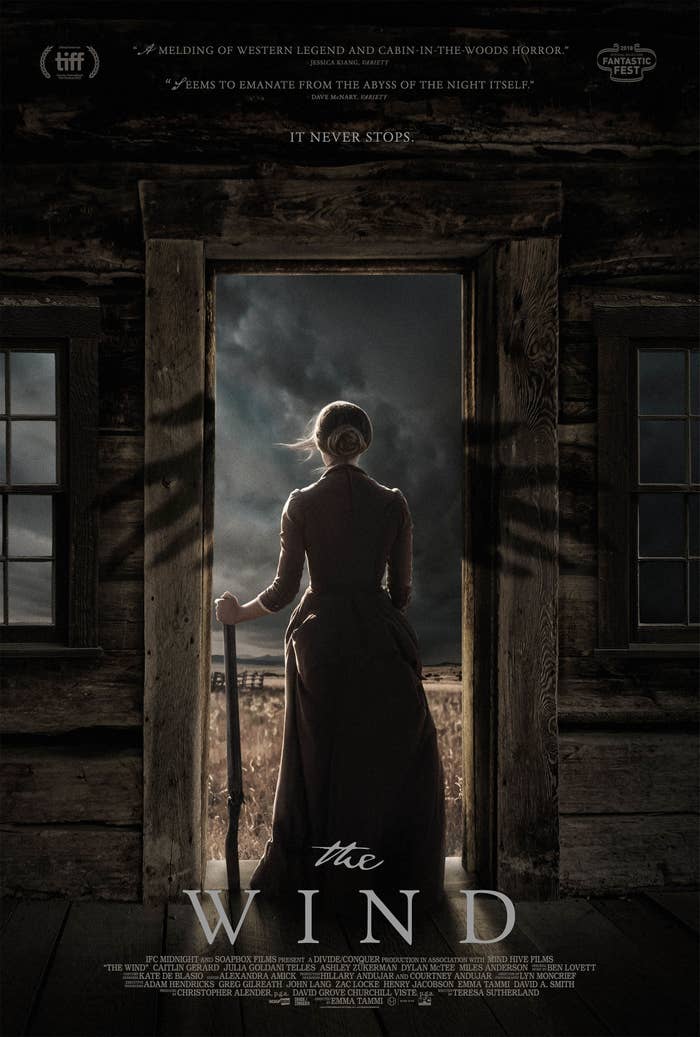 An old-fashioned Western woman looking at the cabin door at a desolate, ominous field