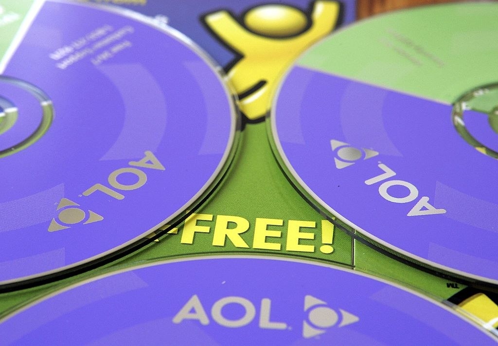 A close up of purple AOL CD-Roms. 