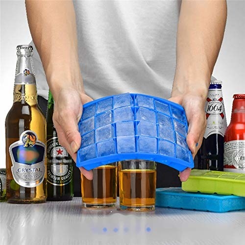A person popping out ice cubes from the ice tray.