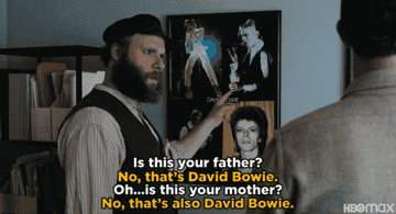 Herschel points to a poster of David Bowie and asks, &quot;Is this your father?&quot; Ben responds, &quot;No, that&#x27;s David Bowie.&quot; Herschel points to a different photo and asks, &quot;Is that your mother?&quot; To which Ben responds again, &quot;No, that&#x27;s also David Bowie.&quot;
