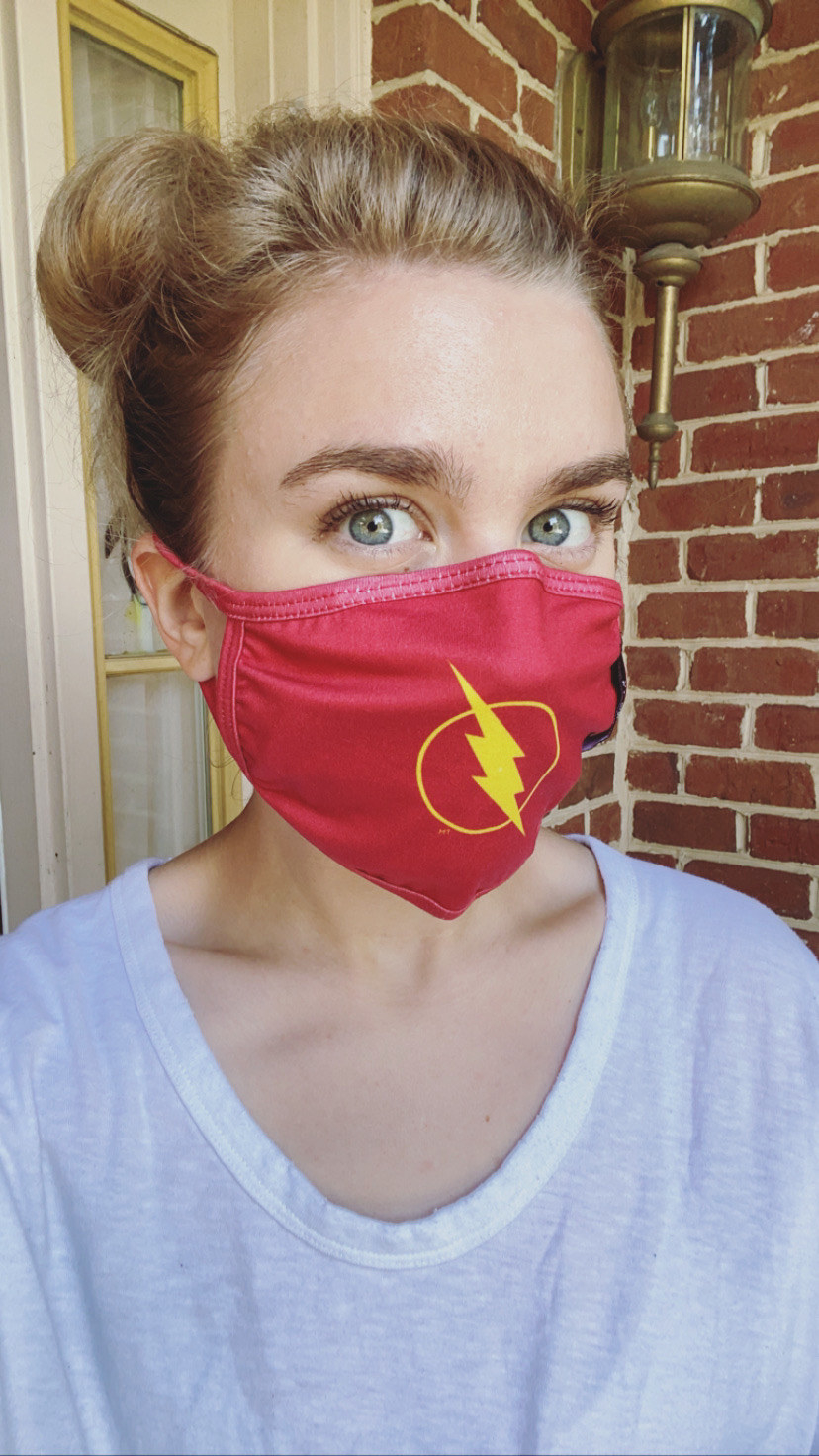 A BuzzFeed editor in a red mask with The Flash logo 