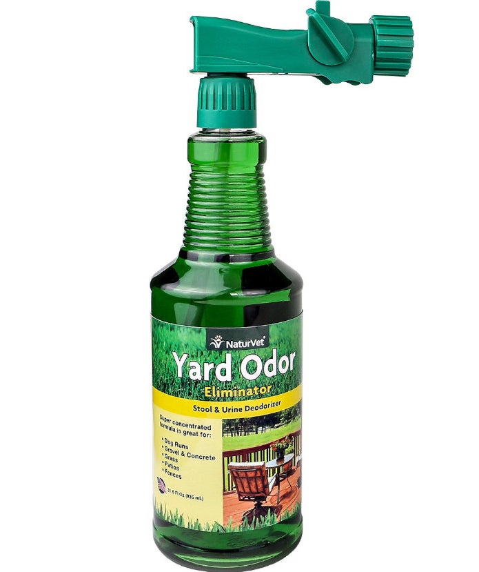 a green bottle of yard odor eliminator