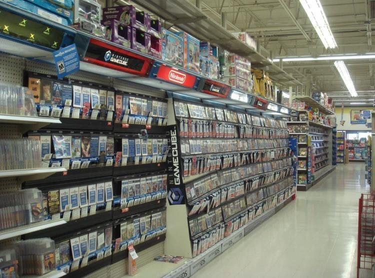 An empty video games aisle at Toys &quot;R&quot; Us.