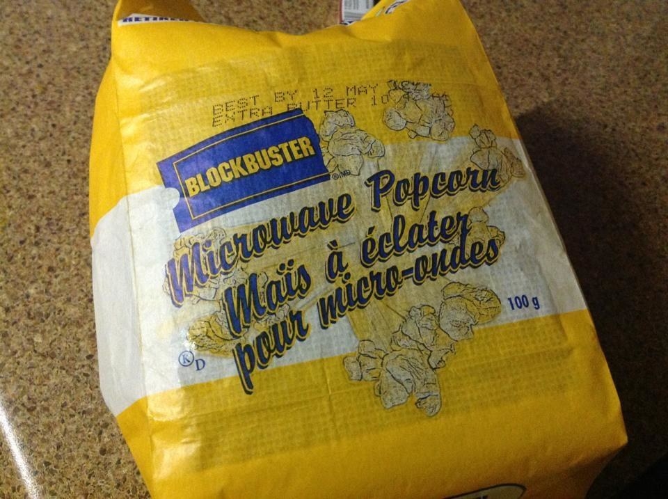A popped bag of Blockbuster microwave popcorn.