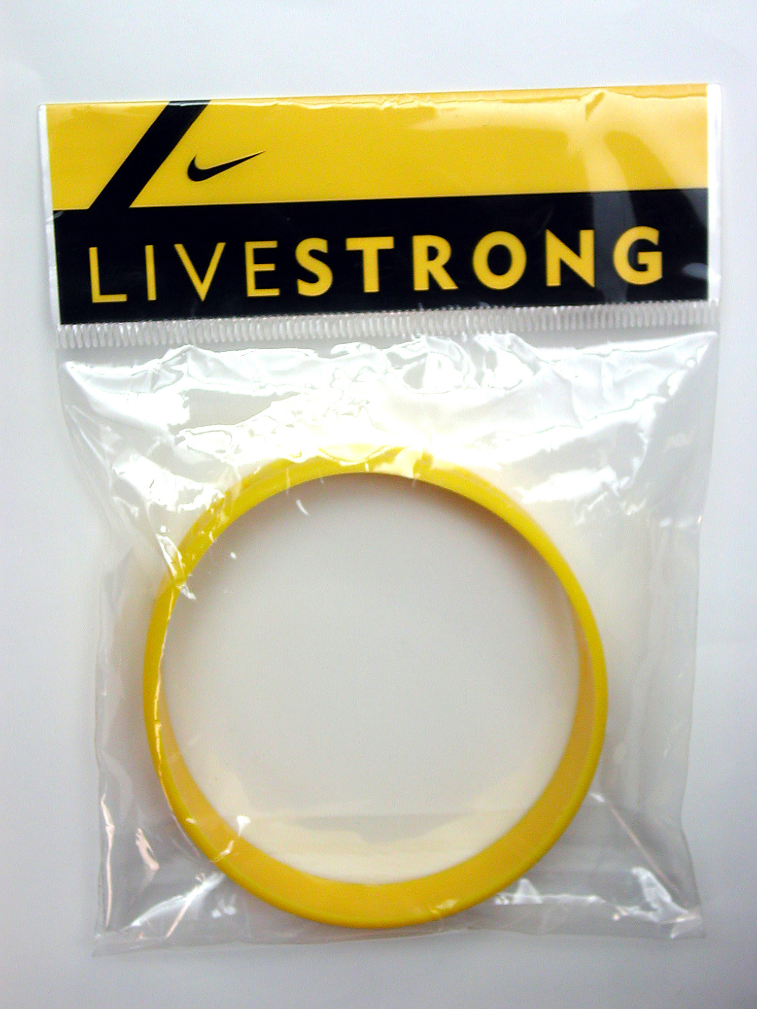 A LiveStrong bracelet in the clear package. 