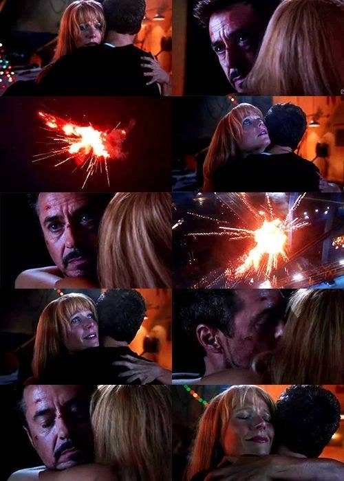 Tony Stark hugs Pepper as his suits explode