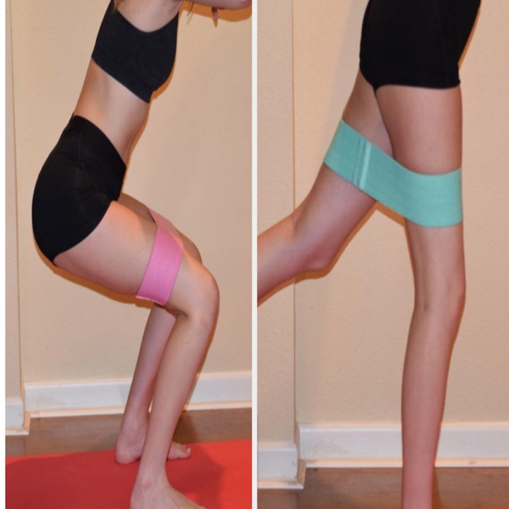 A reviewer uses two separate bands to do squats and standing donkey kicks