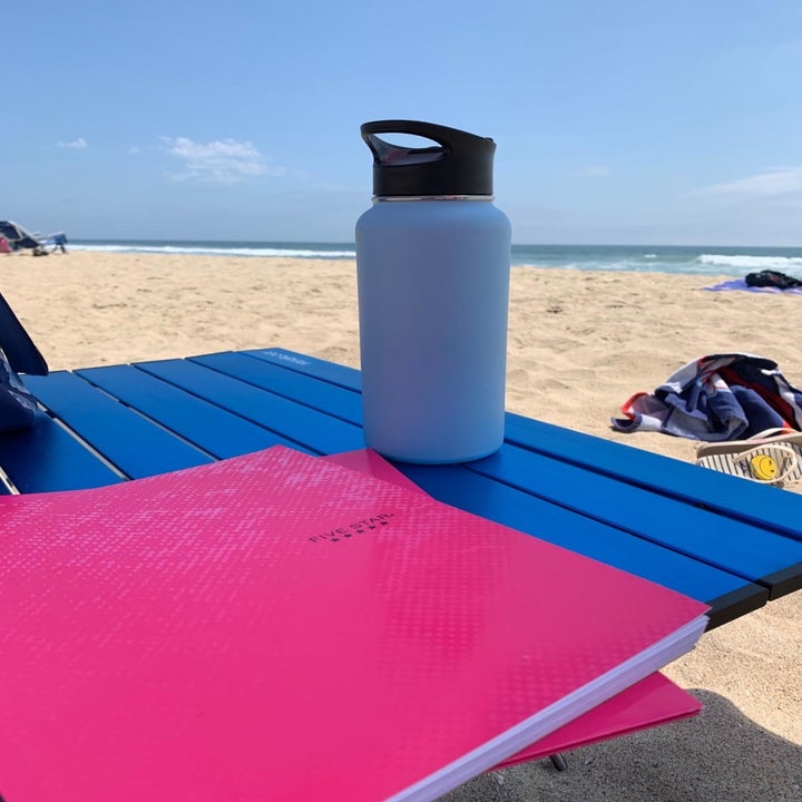 Blue folding table at the beach 