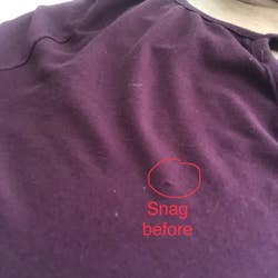 Reviewer photo of a snag in a shirt 