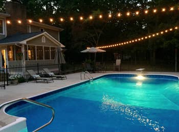 A reviewer of the lights hanging over a pool
