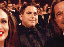 GIF of Jonah Hill doing a &quot;cut it out&quot; gesture