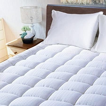 A mattress topper on a bed