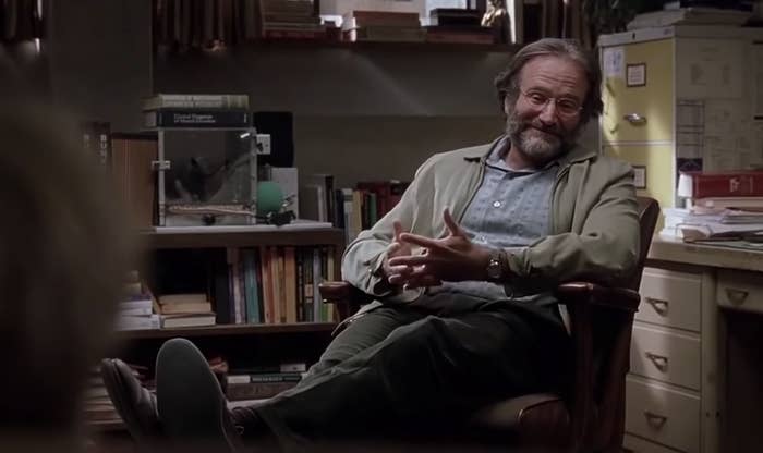 Robin Williams sitting in his office having a psychiatric session with Matt Damn in Good Will Hunting