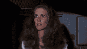 GIF of a woman looking worried