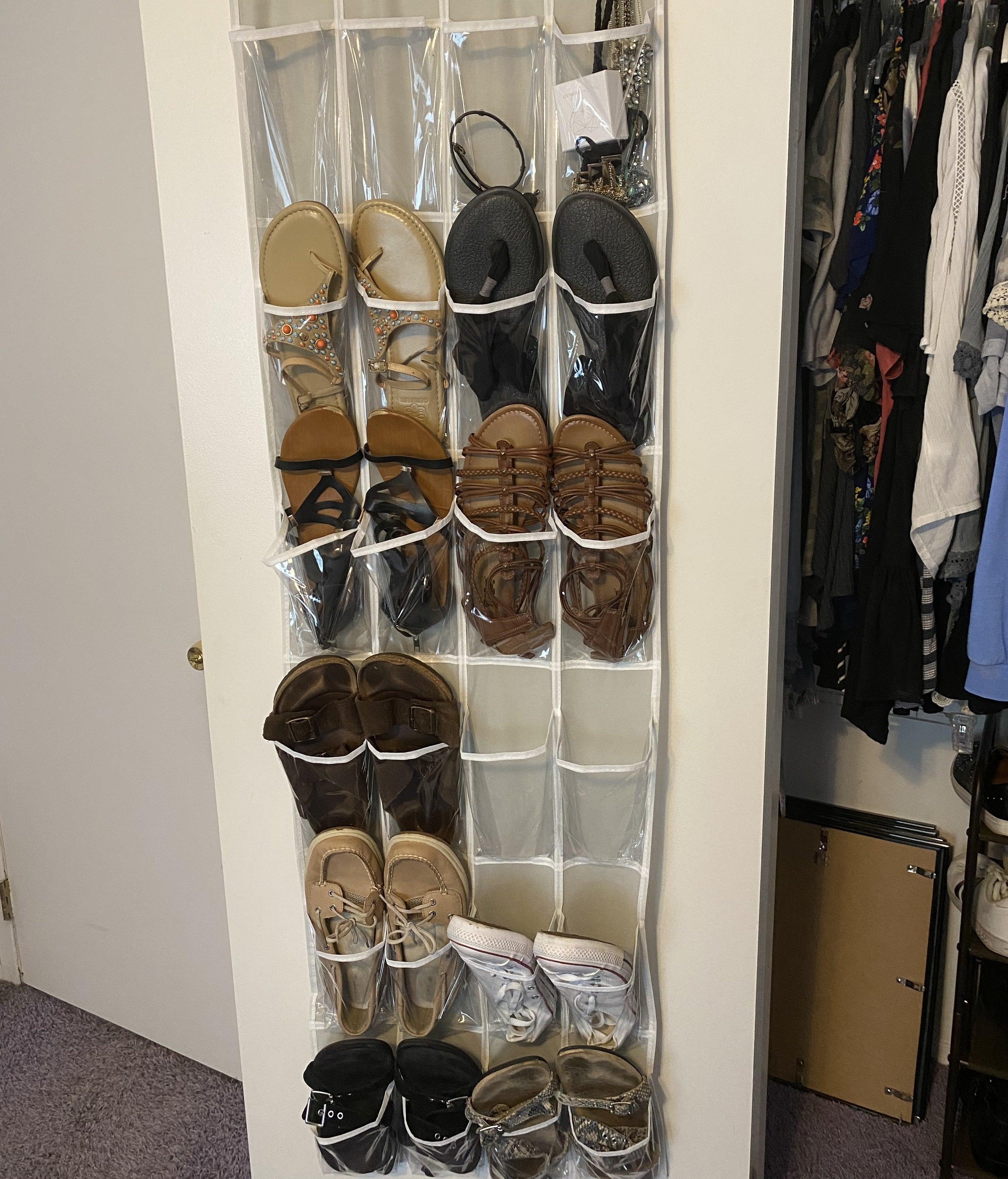 The clear shoe organizer with shoes inside