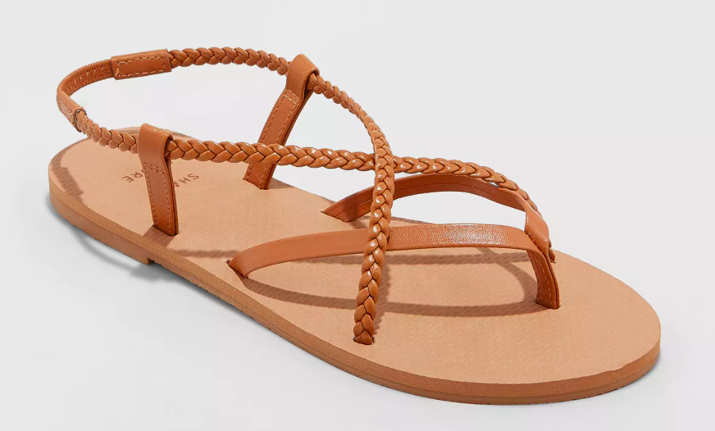 The braided strappy sandal in cognac. 