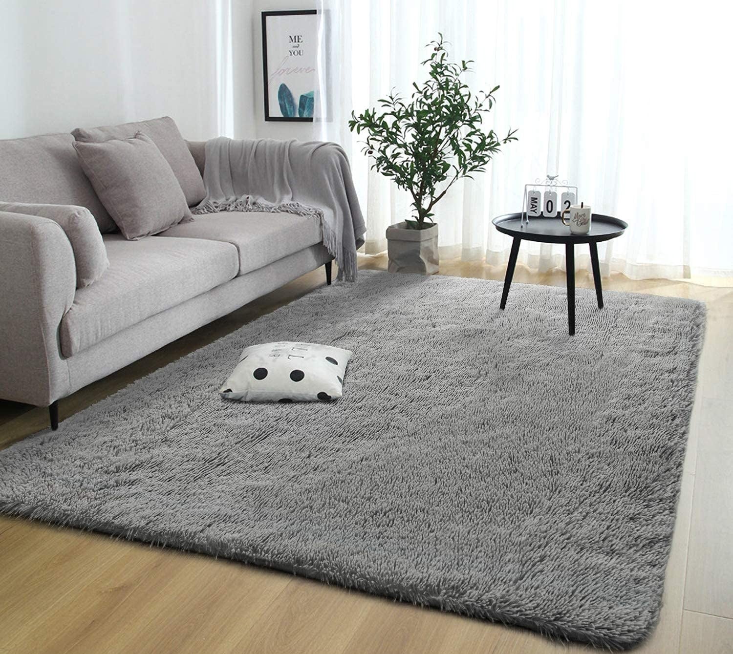 The rug in a living room with a table on top