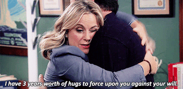Leslie hugging Ron and saying &quot;I have 3 years worth of hugs to force upon you aainst your will&quot;