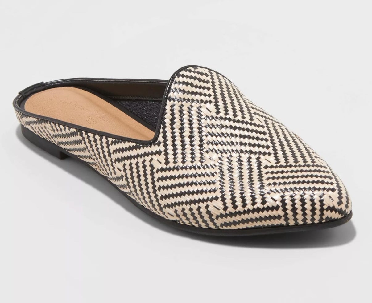 black and white patterned flat mules