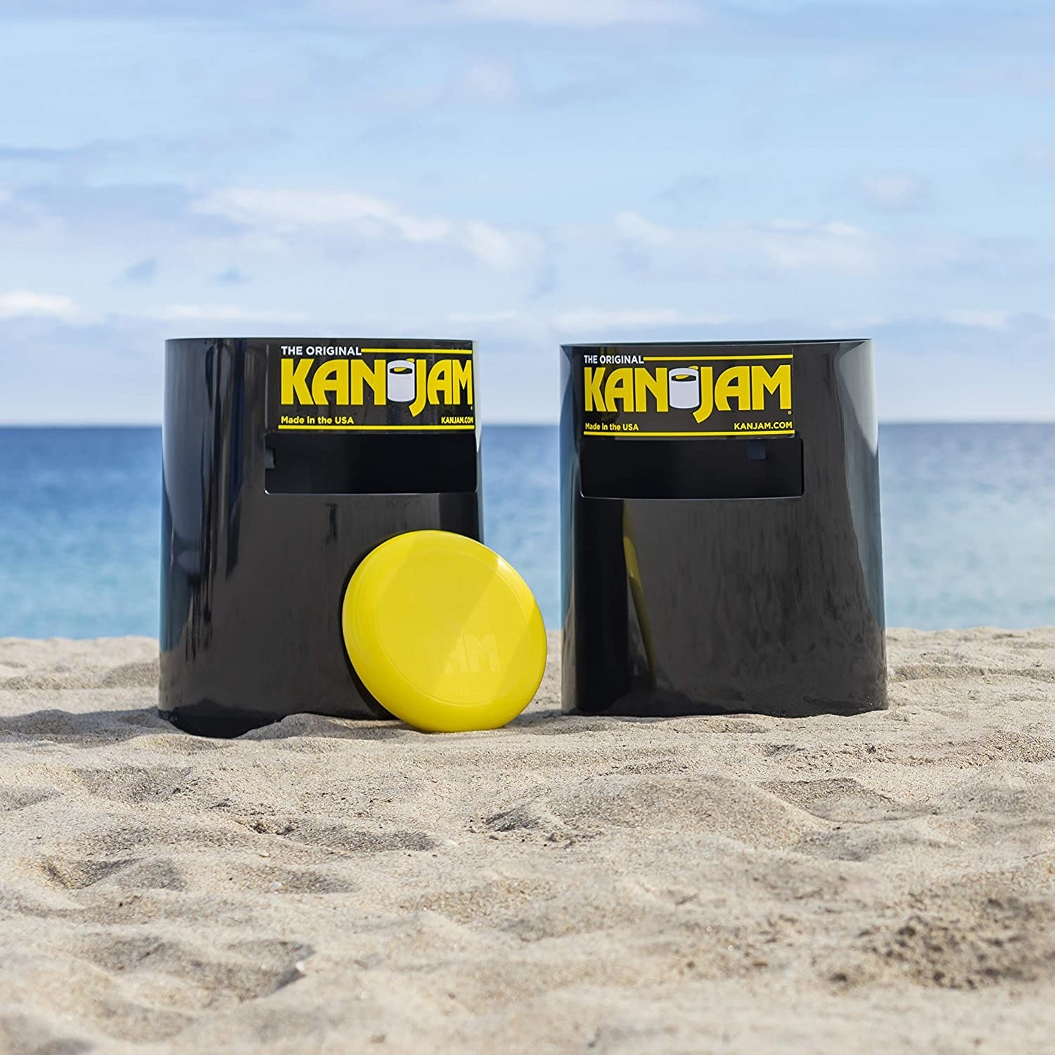 two black Kan Jam targets with a big yellow disc 