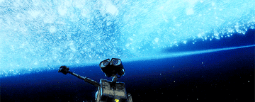 Wall-E touching some shimmering stars