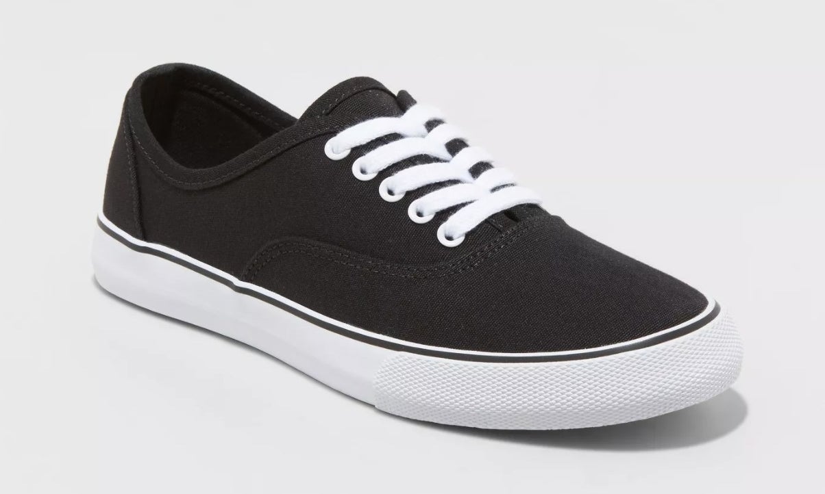 black sneakers with white laces