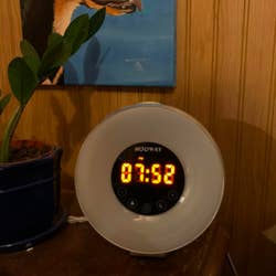 A reviewer photo of a super-bright bedside clock