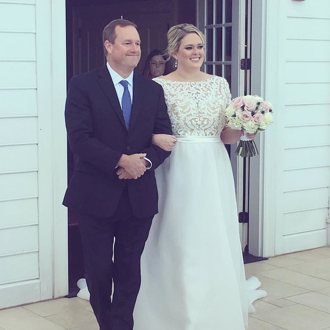 Photo of Jen with her father on her wedding.